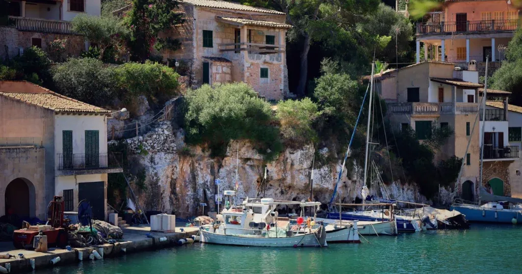 Scenic view of the sea in Spain, with a clear blue sky and calm waters, symbolizing the beauty of Spain's coastal landscapes. Perfect for travelers seeking the best air route to travel Spain and Portugal.