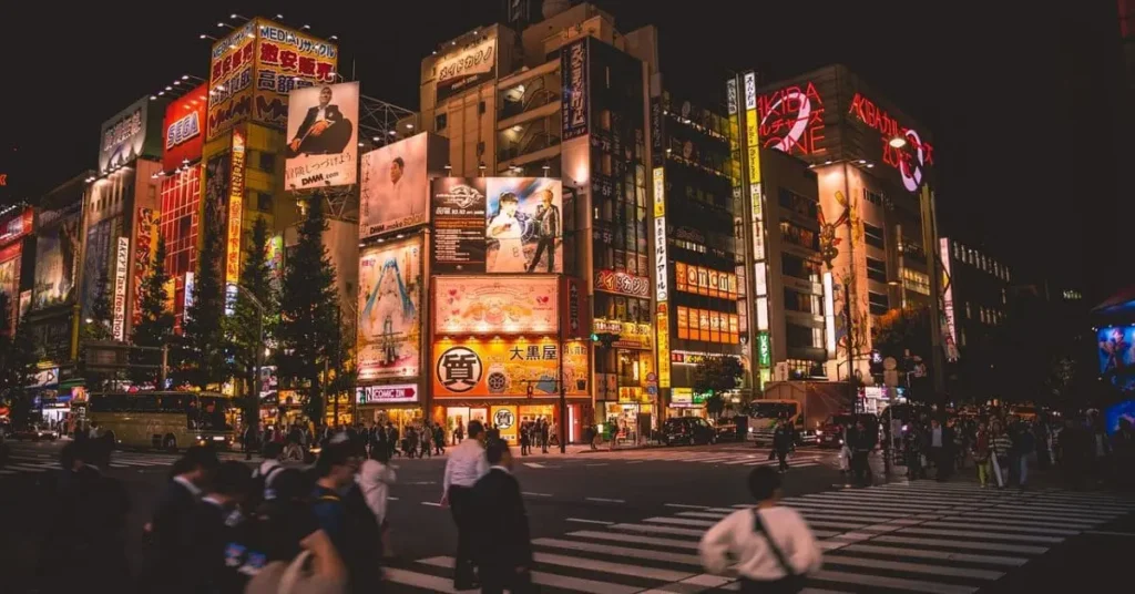 Best places to visit in August, showcasing the vibrant night lights of Tokyo.