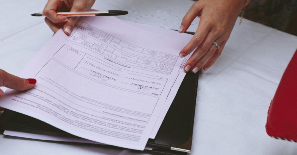 Travel agent license application form with related documents and a globe, symbolizing the steps to apply for a travel agent license.