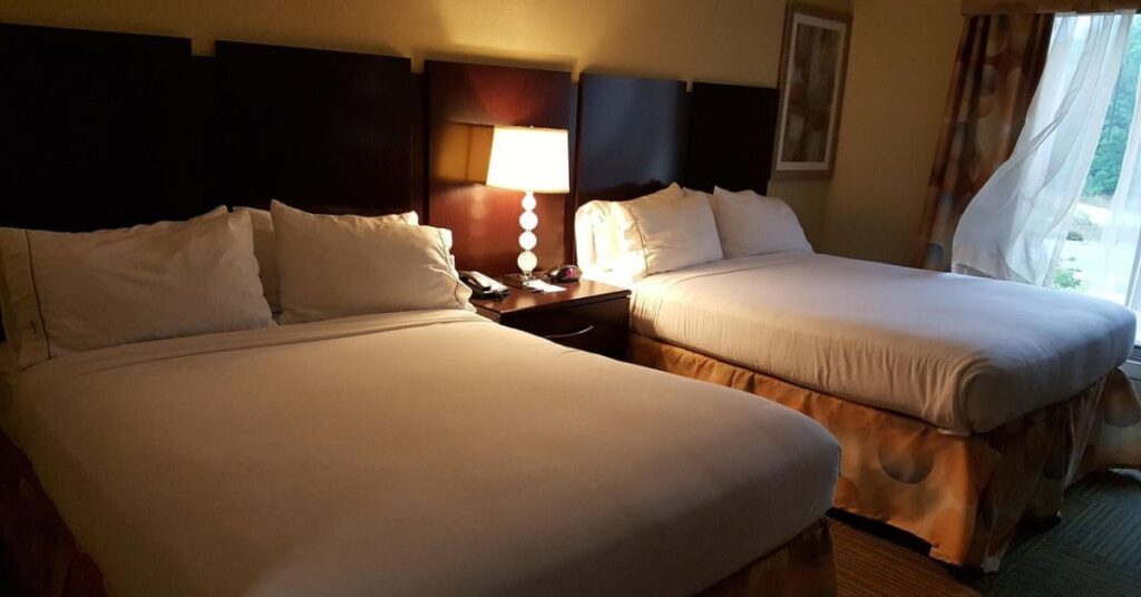 Spacious hotel room with two beds at Travel Inn Hotel