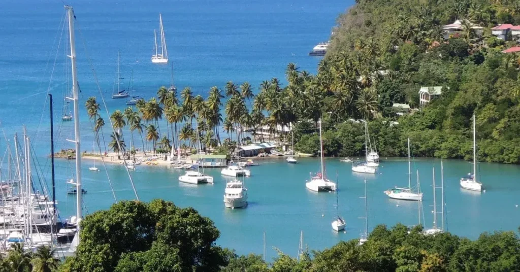 Marigot Bay, St. Lucia, showcasing yachts and lush scenery, highlighting the idyllic destination and factors to consider when determining the best time to visit St Lucia.